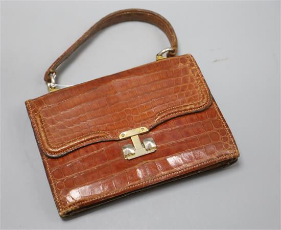 A pre-war crocodile skin handbag